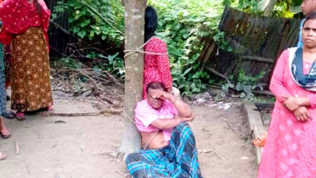 BNP-leader-tied-to-a-tree-with-a-woman